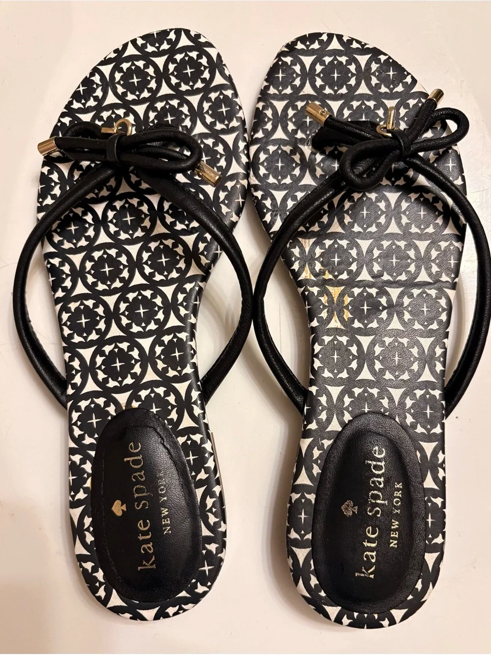 kate spade Black & White Patterned Bow Sandals with Gold Accents